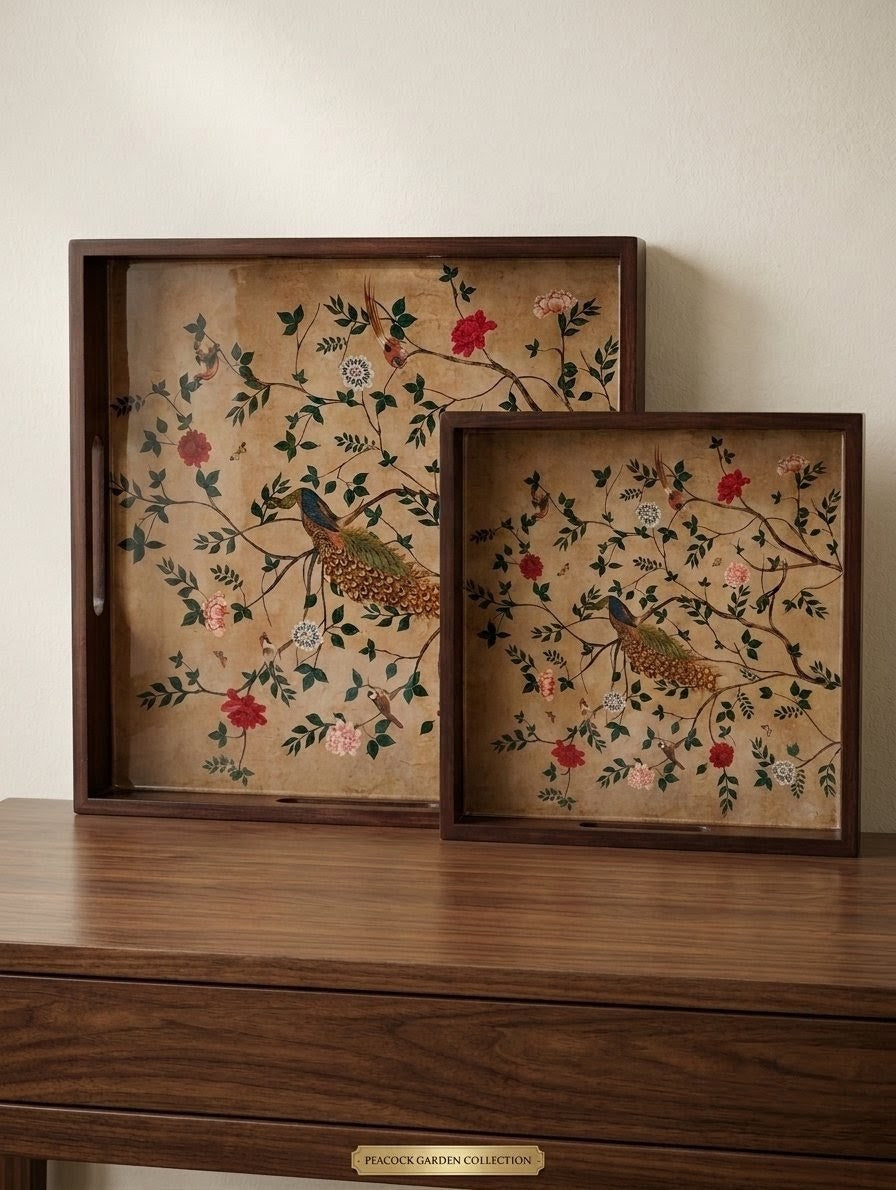 Two rectangular teak wood trays trays. The trays feature an antique-style tan background with hand-painted or embroidered birds, floral branches, and red blossoms.