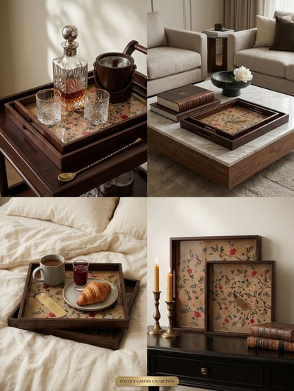 A four-panel collage showcasing teak wood serving trays with vintage floral printed linens in a cozy home setting. The panels depict the trays styled with glassware, books, a coffee mug, a croissant, and candles in a bedroom and living room environment.