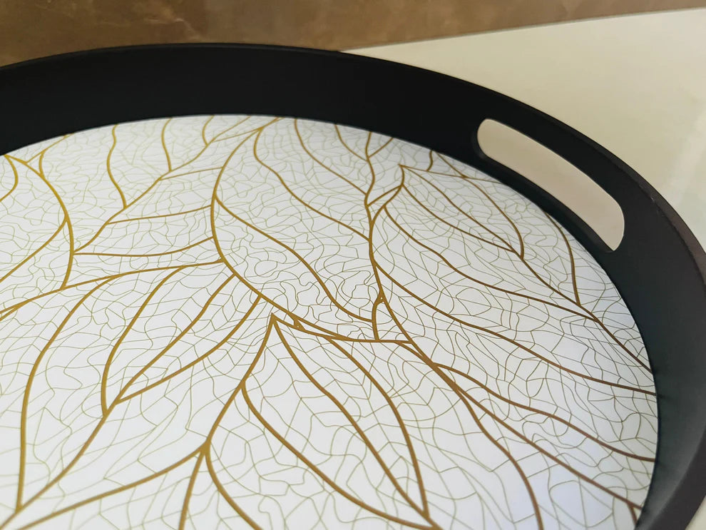 Minimalist round MDF wooden tray with a smooth matte finish and raised edges for home styling.